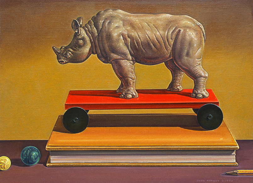 Rhinoceros (A.D.) - Painting by John Hrehov. Oil painting of a wheeled toy rhinoceros standing on a book with marbles and a pencil.